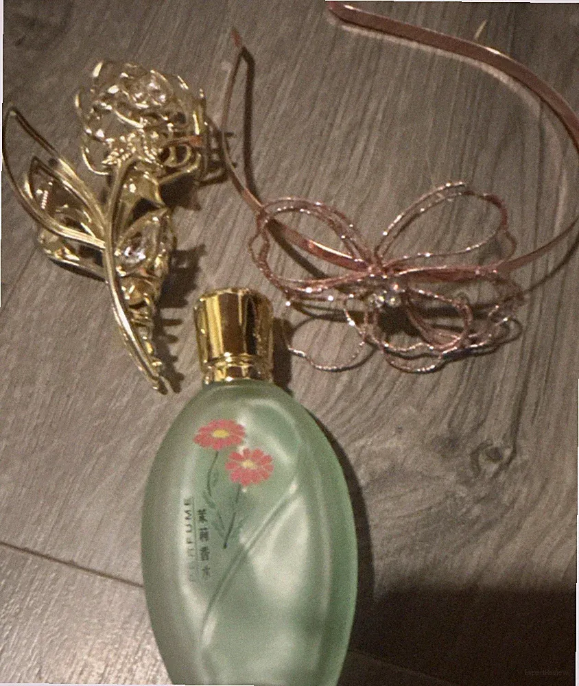 Glass Perfume Bottle with Floral Design and Gold Cap