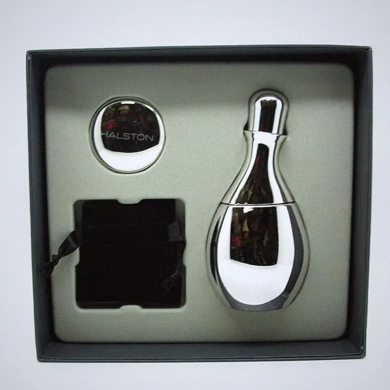 Halston Woman 3.4 fl oz EDP Spray + .10 oz Solid Perfume Gift Set for Women
