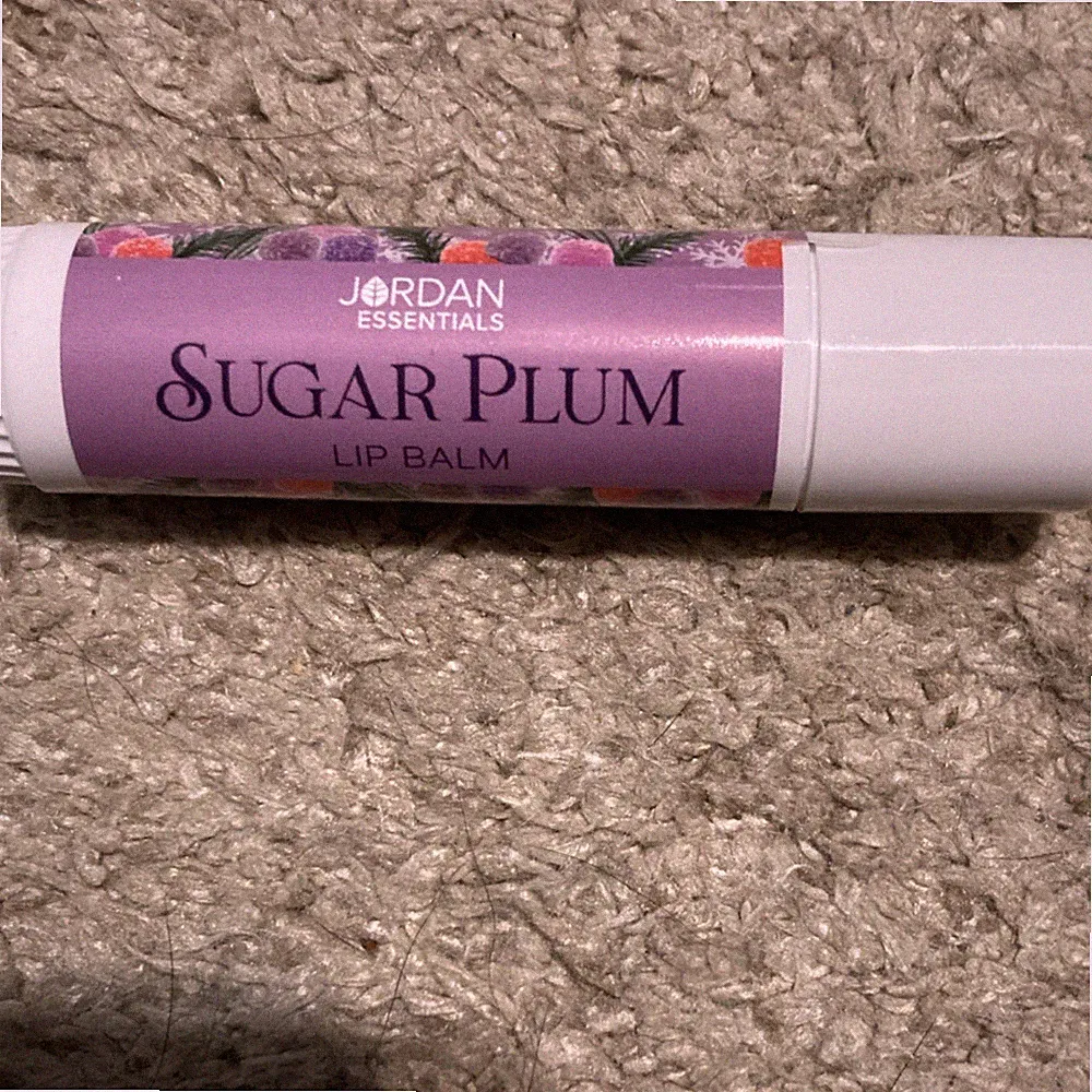Jordan Essentials Lip Balm Sugar Plum Scent 0.75 oz Purple Solid Stick