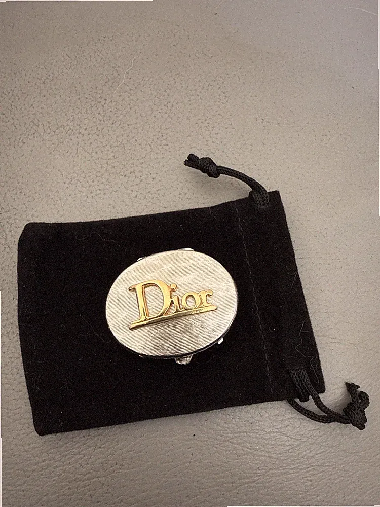 Vintage Christian Dior solid perfume compact, holder